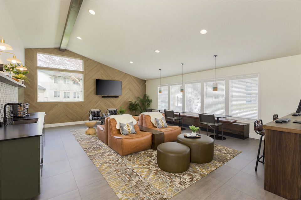 Clubhouse at Cedar House Apartments featuring luxury amenities including a lounge area and game room in vibrant community