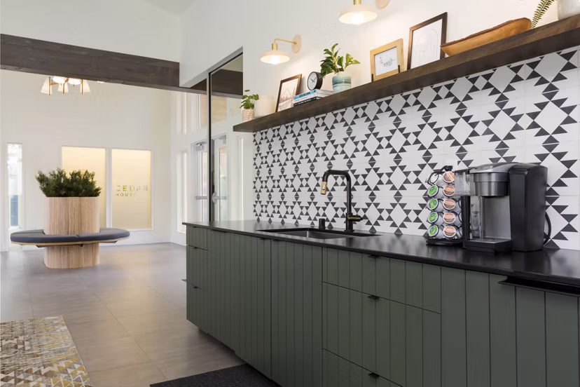 Modern clubhouse with stylish lounge areas at Cedar House Apartments