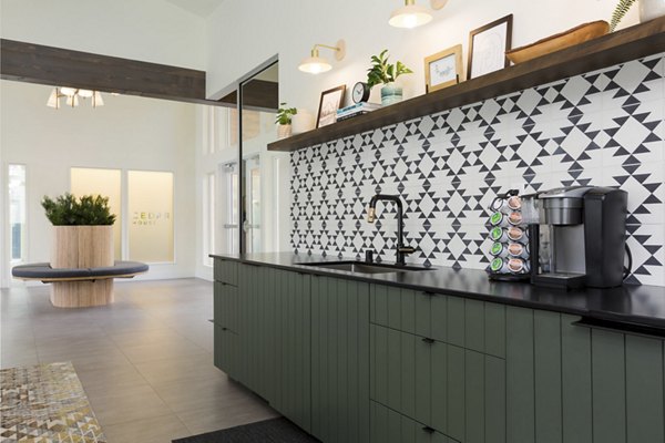 Modern clubhouse with stylish lounge areas at Cedar House Apartments