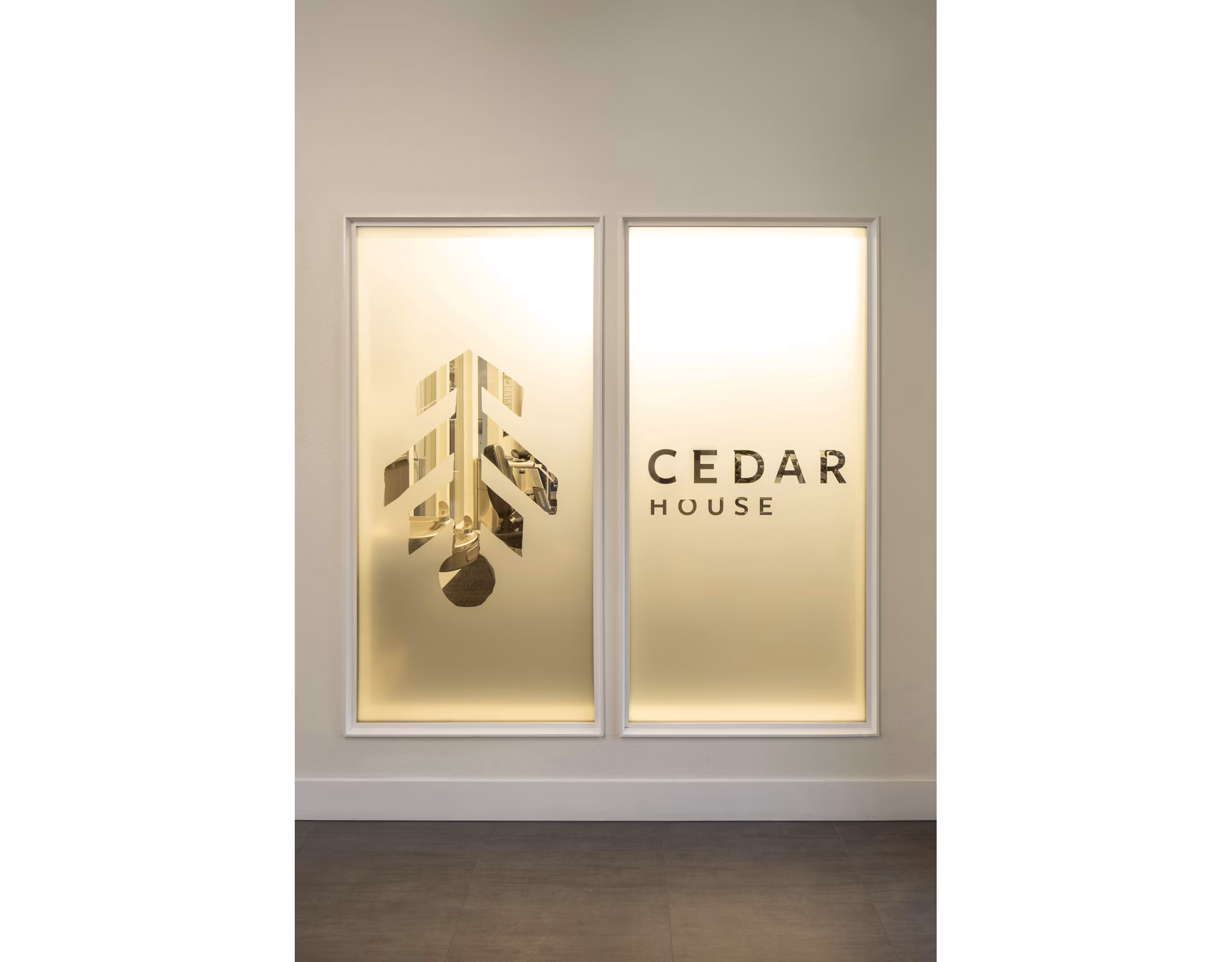 Clubhouse with modern design and lounge seating at Cedar House Apartments, a luxury Greystar community