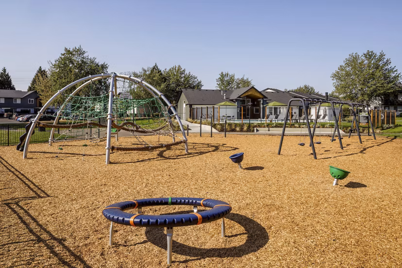 Cedar House Apartments: Colorful playground equipment for residents' families