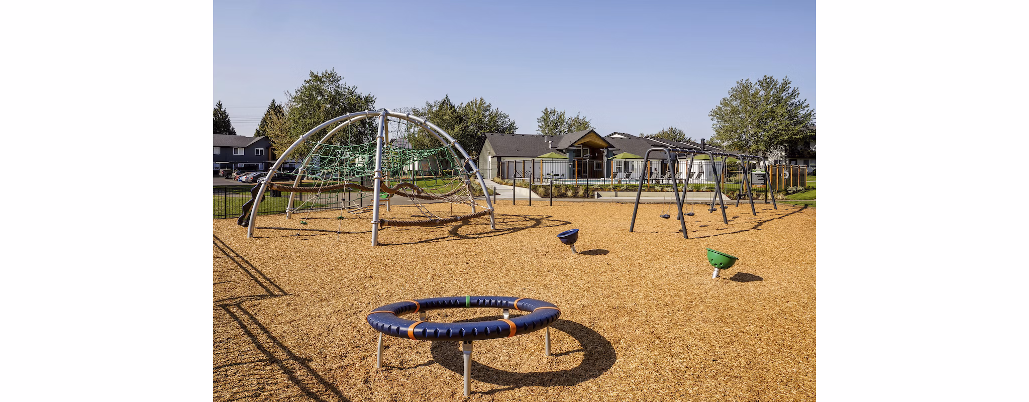 Cedar House Apartments: Colorful playground equipment for residents' families