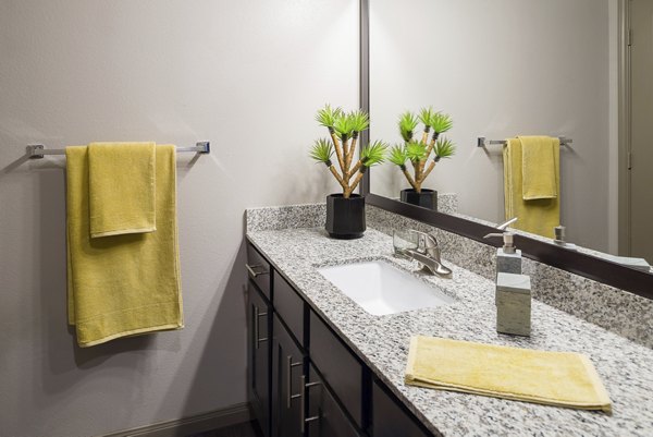 Spacious bathroom with modern fixtures at Sapphire Bay Apartments