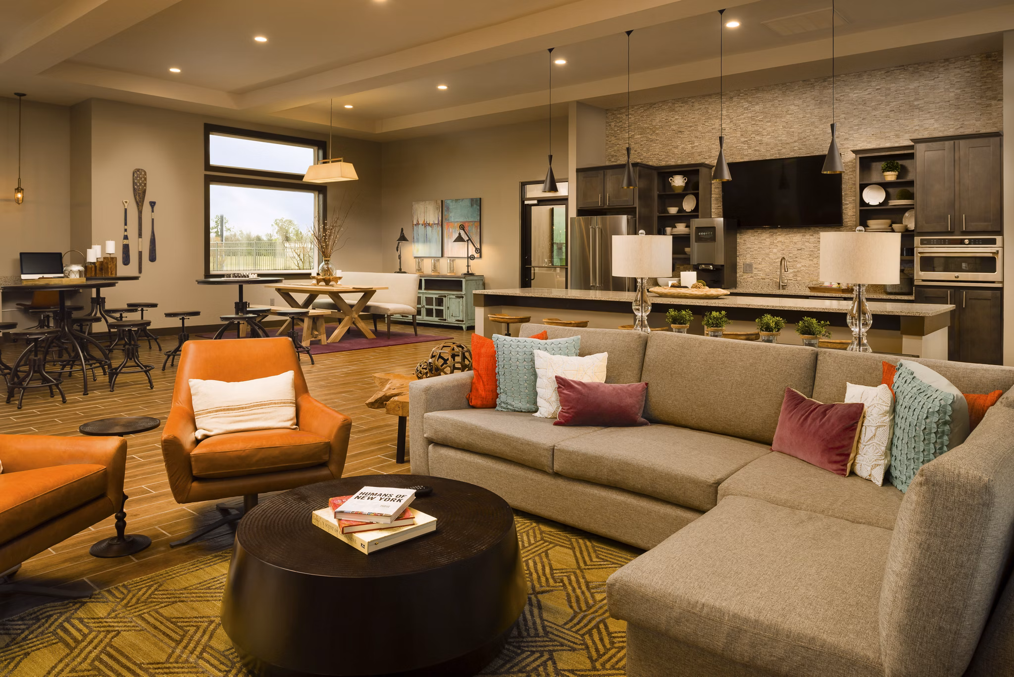 Sapphire Bay Apartments: Modern clubhouse with elegant design and ample seating areas