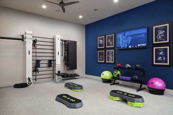 Modern fitness center with state-of-the-art equipment at Sapphire Bay Apartments