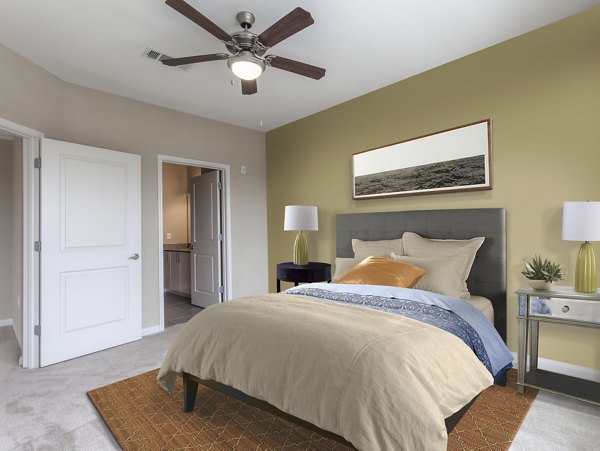 Cozy bedroom with modern decor at Arlo Buffalo Heights Apartments