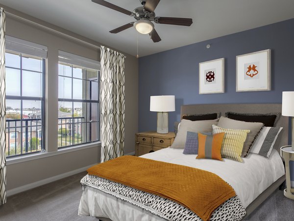 Elegant bedroom with modern decor at Arlo Buffalo Heights Apartments