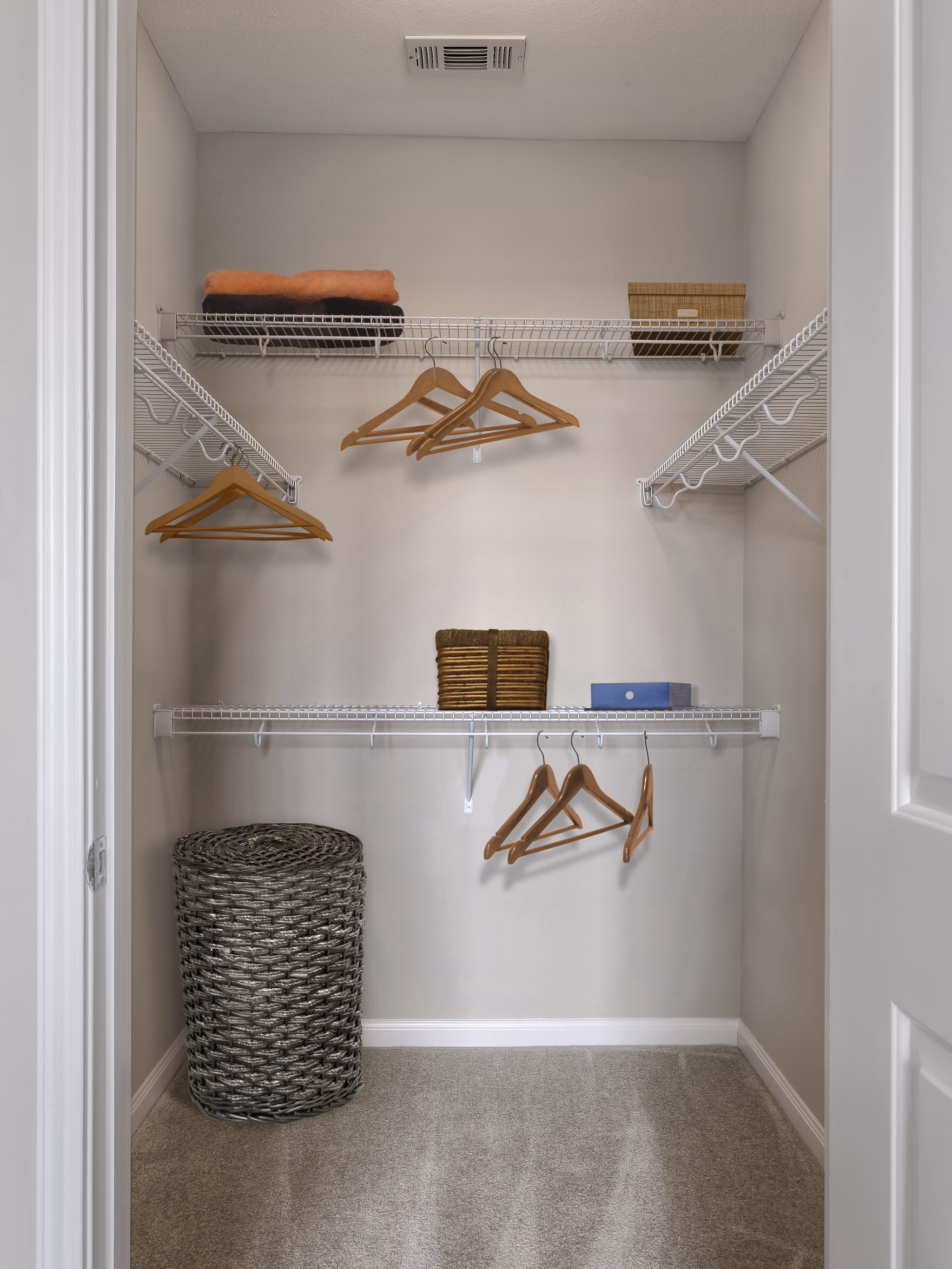 Spacious closet with custom shelving at Arlo Buffalo Heights Apartments, a blend of luxury and modern living in a premium location