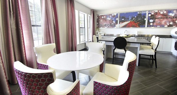 Clubhouse featuring modern decor and comfortable seating at Arlo Buffalo Heights Apartments