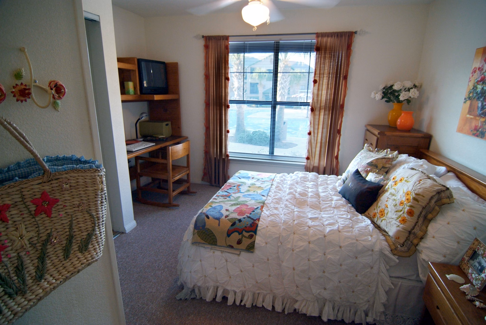 Modern bedroom with stylish decor in Reveille Ranch Apartments