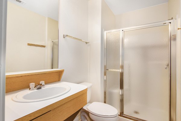 Bathroom with modern fixtures and sleek design in Reveille Ranch Apartments