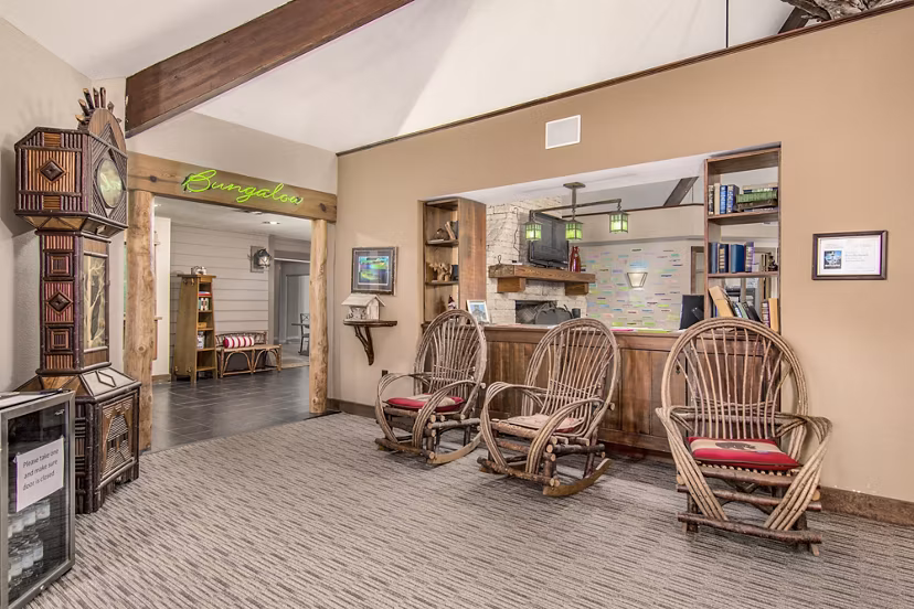 Clubhouse with modern design and comfortable seating at Reveille Ranch Apartments