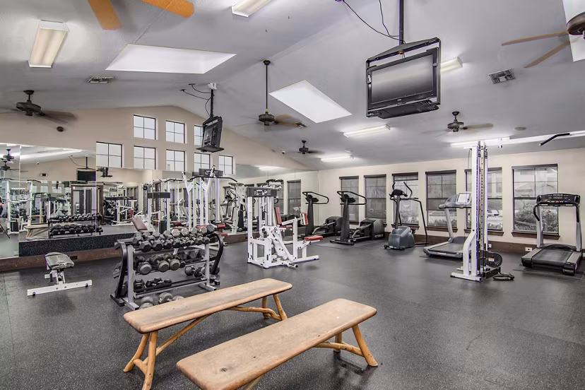 State-of-the-art fitness center with modern equipment at Reveille Ranch Apartments