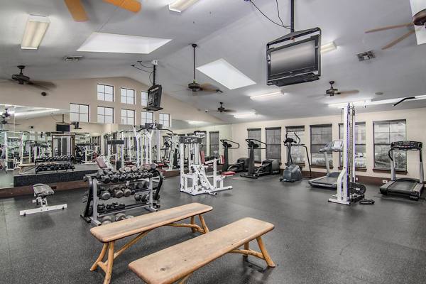fitness center at Reveille Ranch Apartments