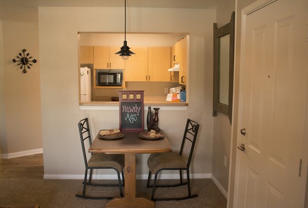 Modern kitchen with granite countertops at Reveille Ranch Apartments, offering luxury living and upscale design for an enhanced lifestyle experience