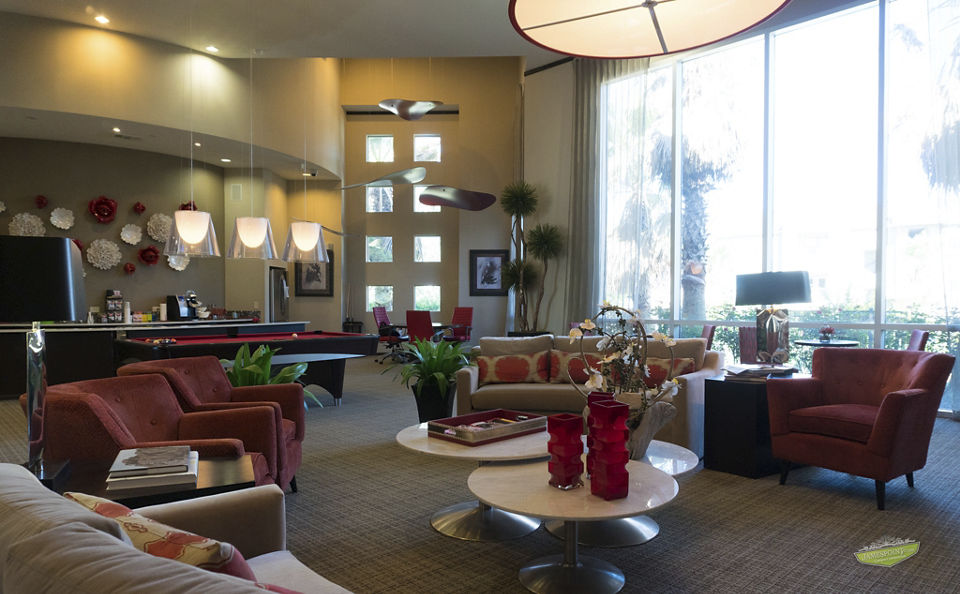 Luxurious clubhouse with modern decor at 21 Gramercy Park Apartments, perfect for hosting gatherings and socializing