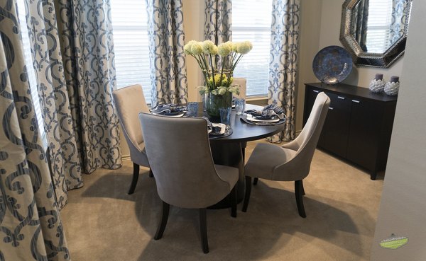 Dining area with chic decor and modern lighting at 21 Gramercy Park Apartments, a Greystar luxury residence