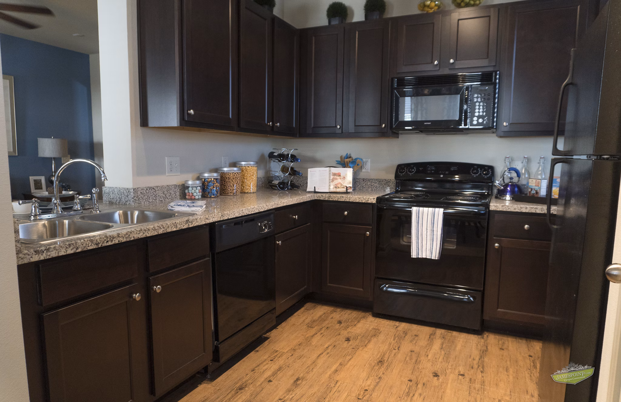 Contemporary kitchen with stainless steel appliances at 21 Gramercy Park Apartments