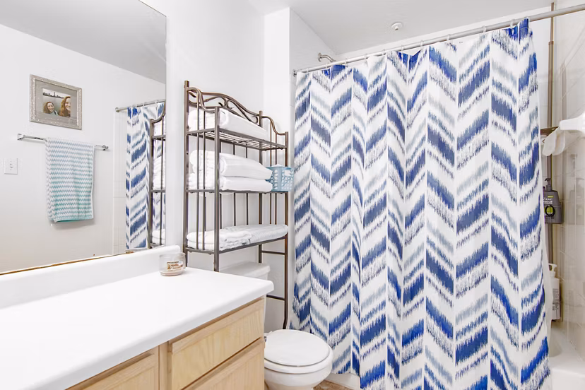 Modern bathroom featuring elegant fixtures at The Ridge Apartments