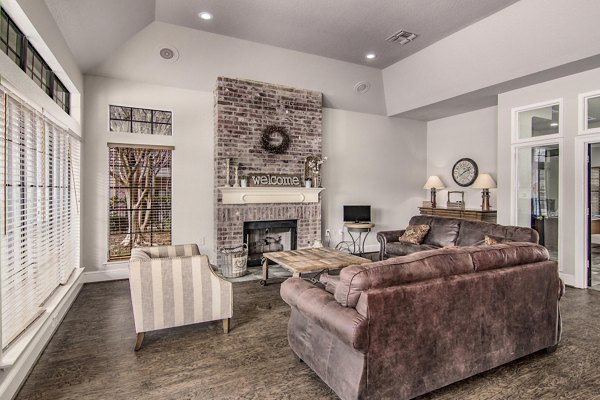 Modern clubhouse with cozy seating and sleek design at The Ridge Apartments, perfect for social gatherings and relaxation