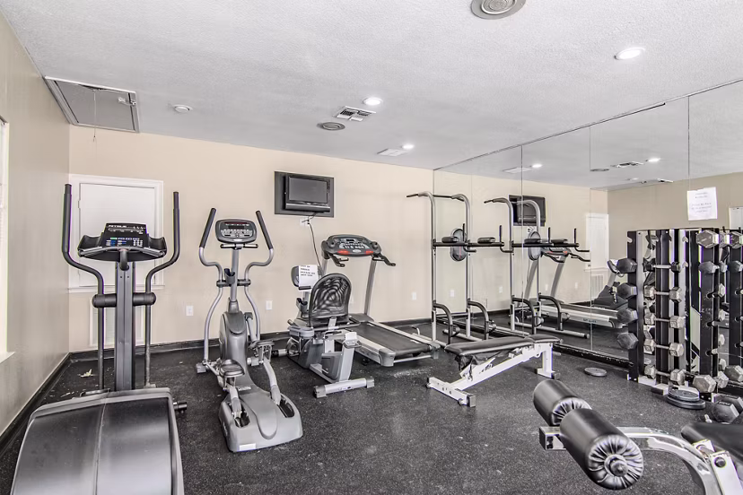 State-of-the-art fitness center with modern equipment at The Ridge Apartments