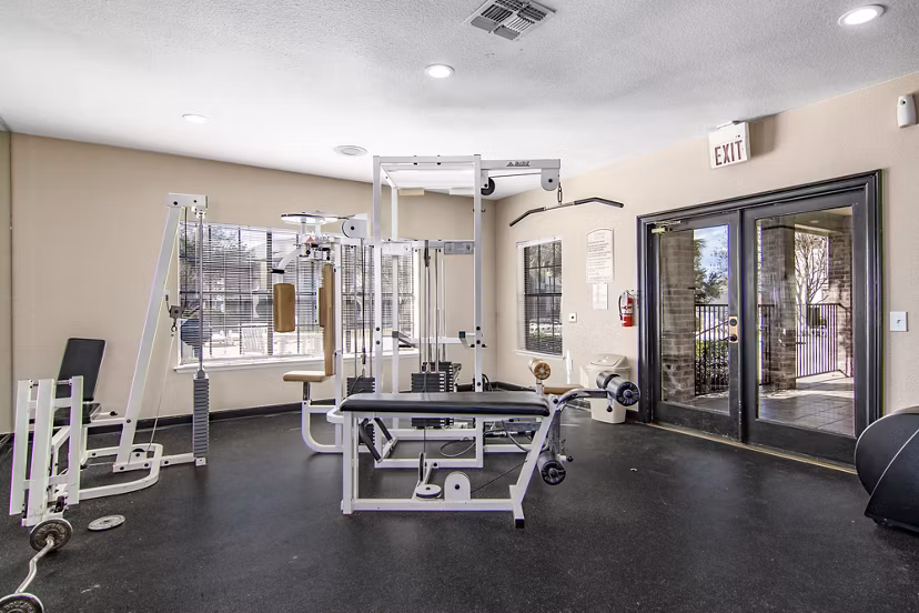 State-of-the-art fitness center with modern equipment at The Ridge Apartments