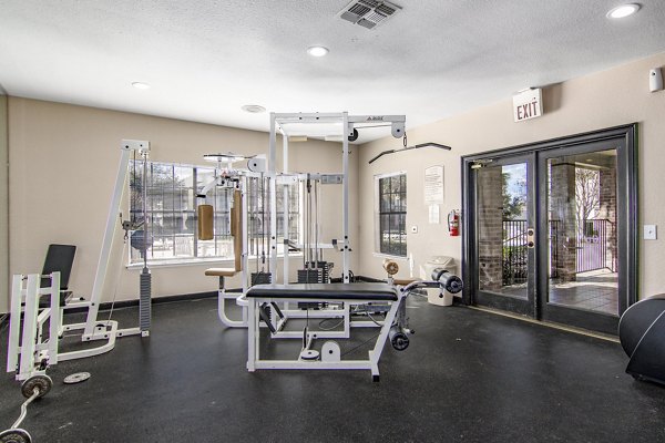 State-of-the-art fitness center with modern equipment at The Ridge Apartments