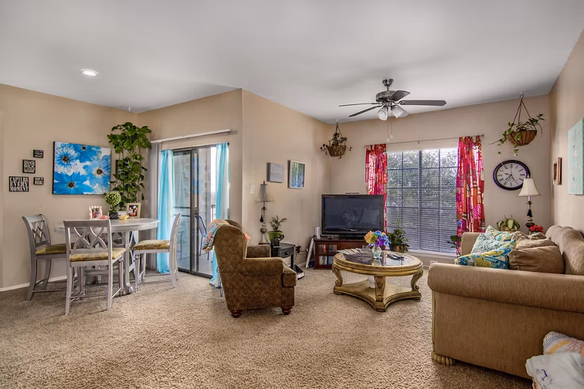 Spacious living room with contemporary furnishings at The Ridge Apartments, Greystar luxury apartments