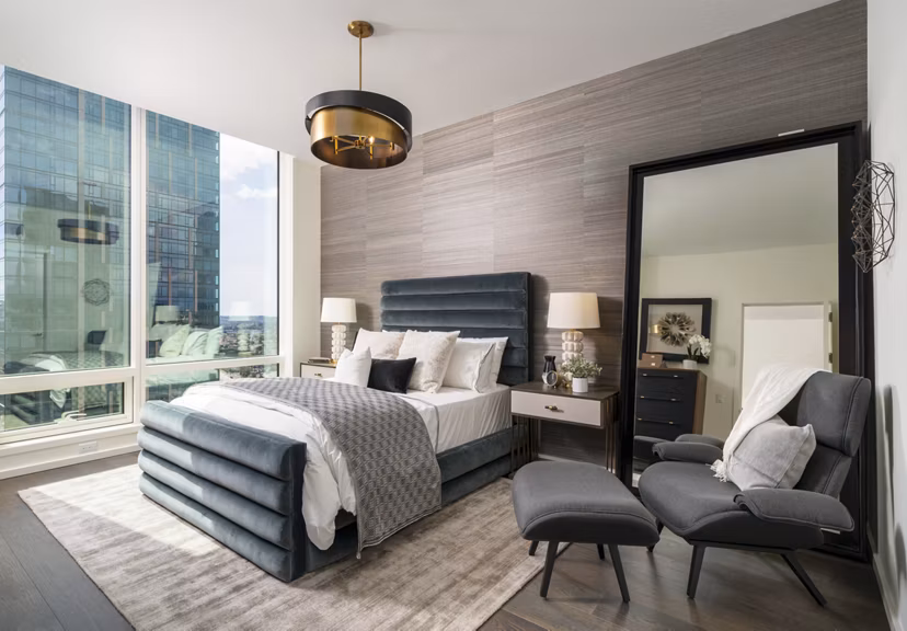 THEA at Metropolis: Elegant bedroom with contemporary design and city views in luxury apartments