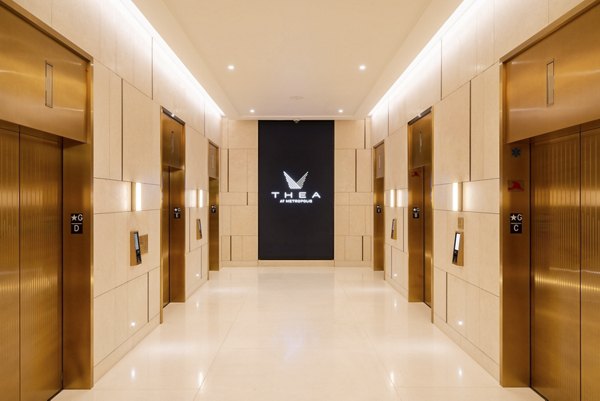 Clubhouse with modern design and luxurious seating at THEA at Metropolis Apartments, a Greystar community in downtown Los Angeles
