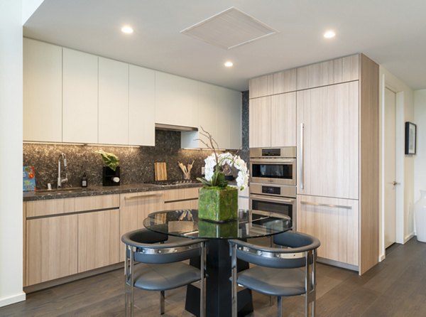 dining area at THEA at Metropolis Apartments