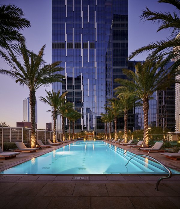 Rooftop pool with skyline views at THEA at Metropolis luxury apartments