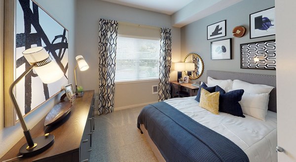 Luxury bedroom with elegant decor at Nexus at Orenco Station Apartments