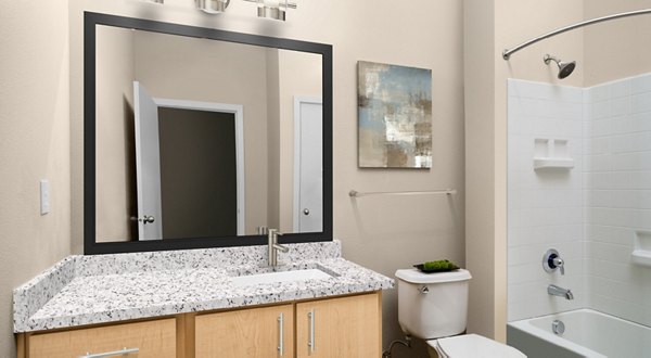 Modern bathroom with sleek fixtures at Nexus at Orenco Station Apartments, highlighting luxury living near  training facilities