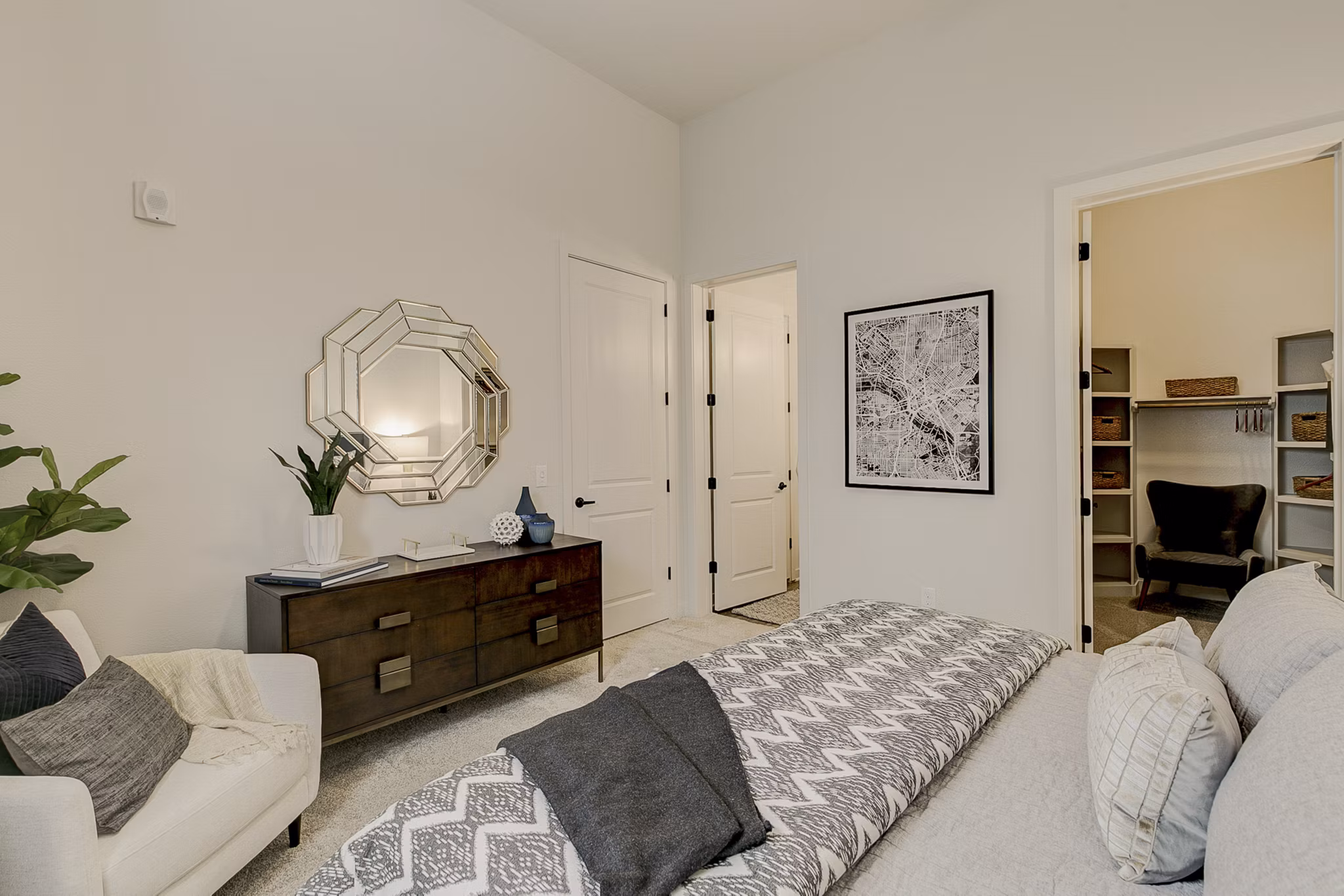 Cozy bedroom with modern decor at Addison Grove Apartments, perfect for luxury living