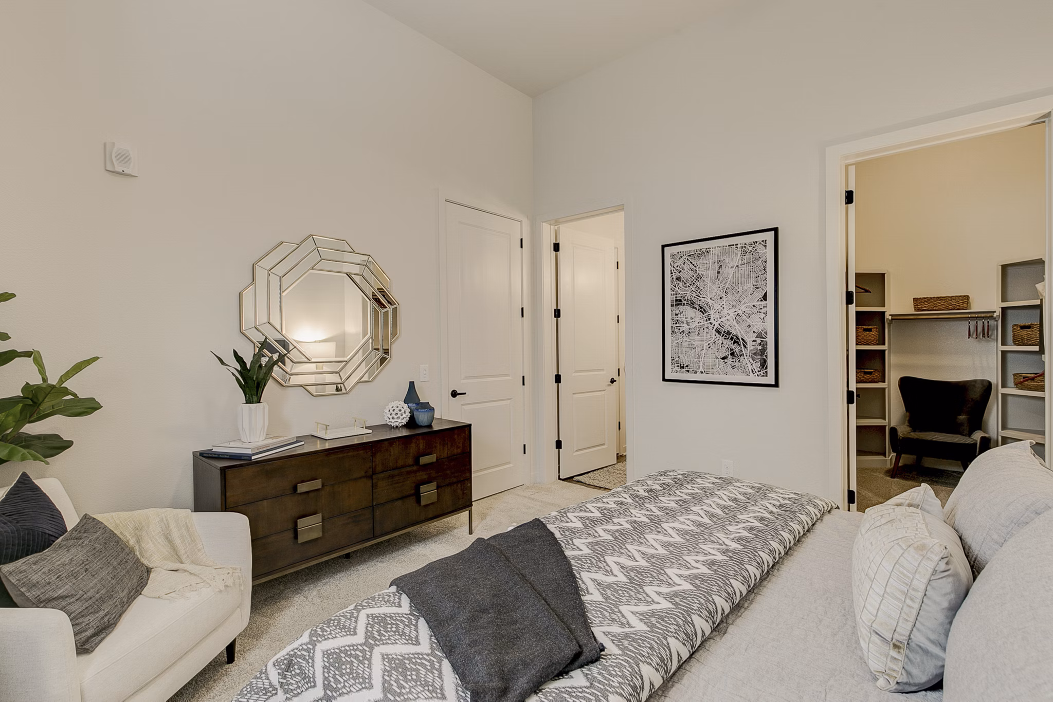 Cozy bedroom with modern decor at Addison Grove Apartments, perfect for luxury living