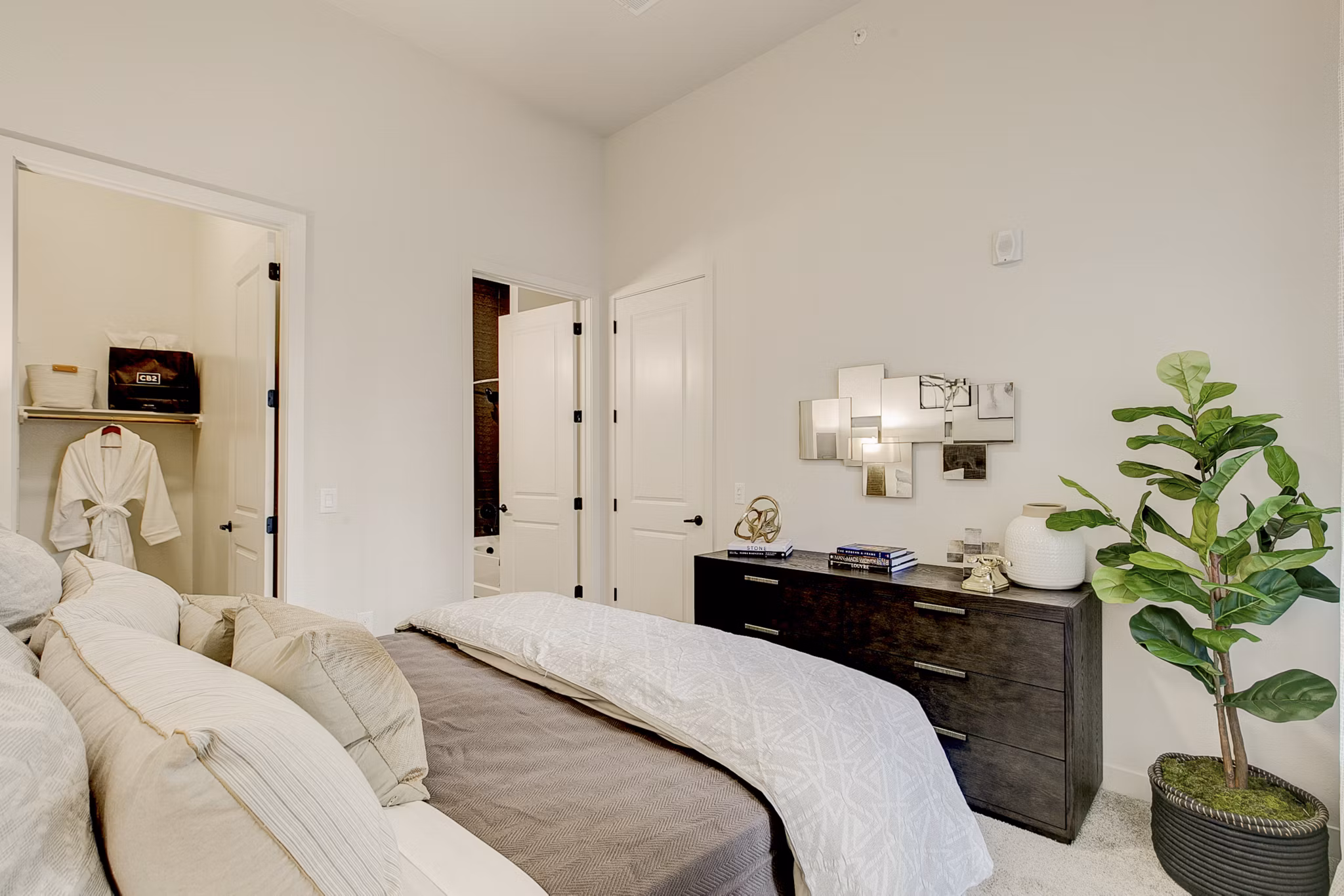 Modern bedroom with elegant decor at Addison Grove luxury apartments