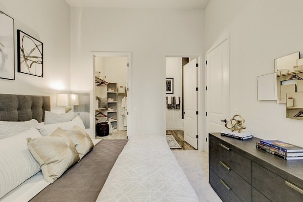 Stylish bedroom with contemporary decor in Addison Grove Apartments