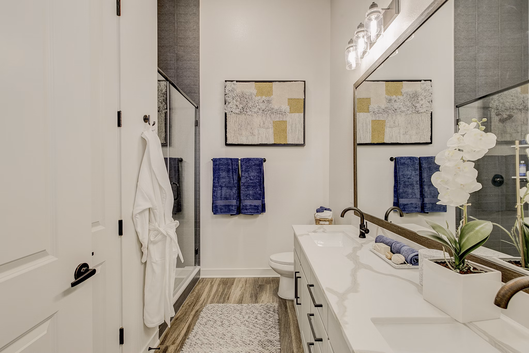 Modern bathroom with sleek fixtures at Addison Grove Apartments