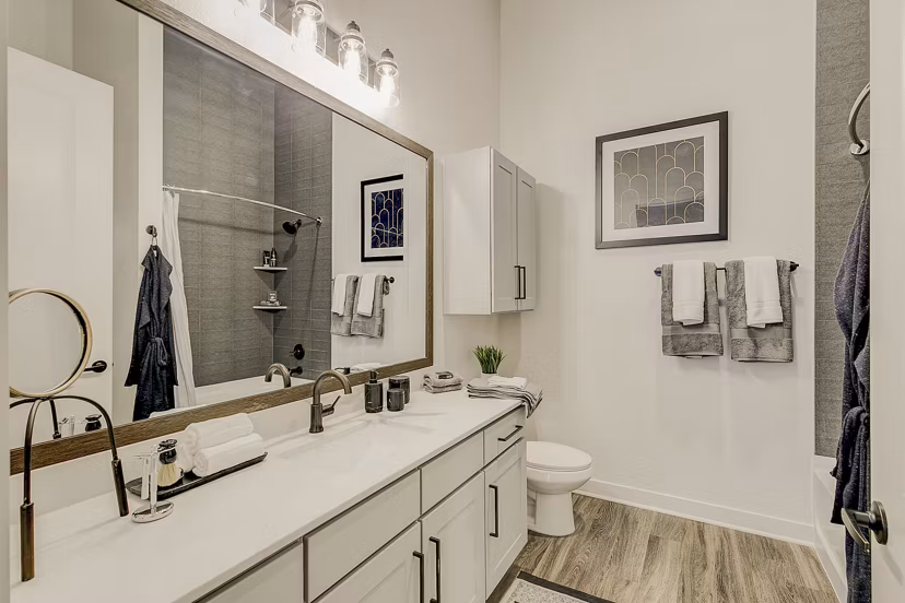 Modern bathroom with sleek fixtures at Addison Grove Apartments