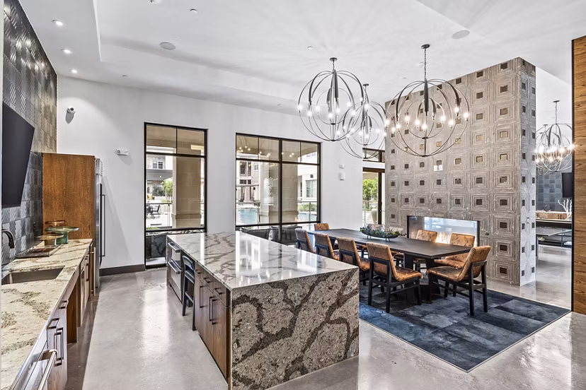 Clubhouse lobby with modern seating and decor at Elan Addison Grove Apartments, providing luxury living in an inviting community space