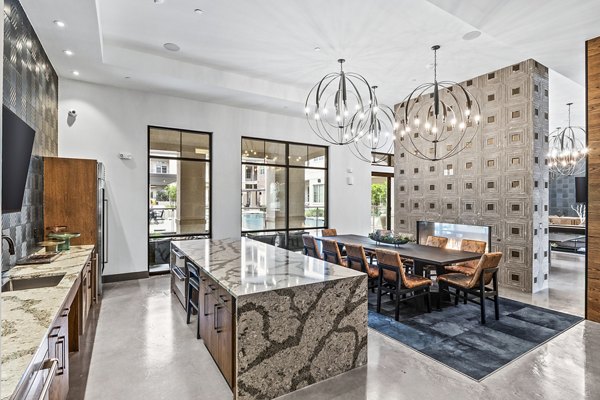 Clubhouse lobby with modern seating and decor at Elan Addison Grove Apartments, providing luxury living in an inviting community space