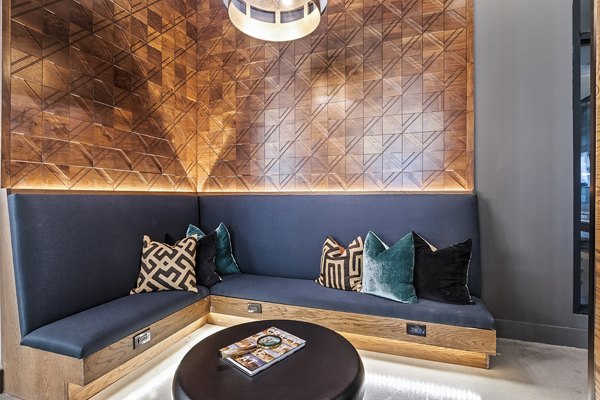 Lobby area featuring modern seating and decor at Elan Addison Grove Apartments, luxury community