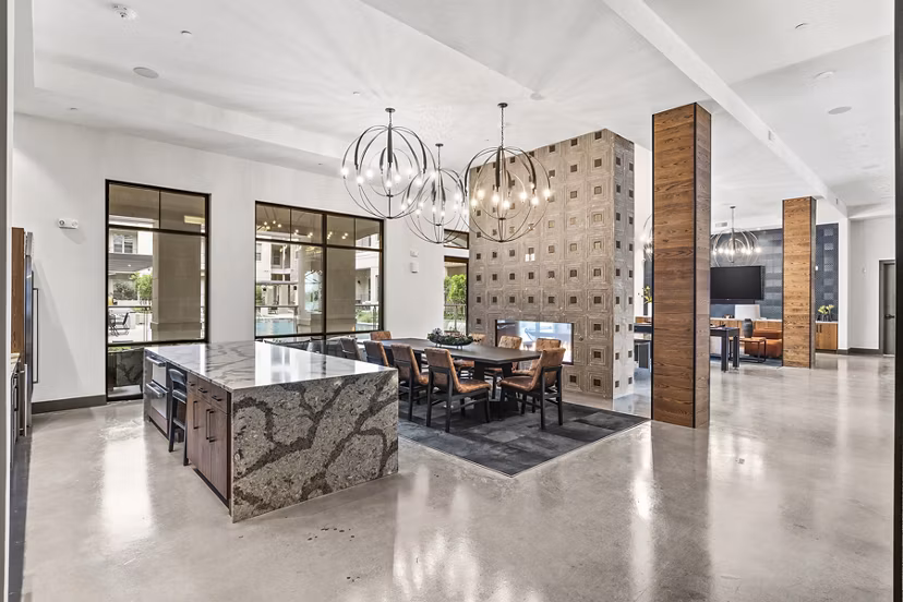Clubhouse lobby with stylish seating and modern decor in Elan Addison Grove Apartments