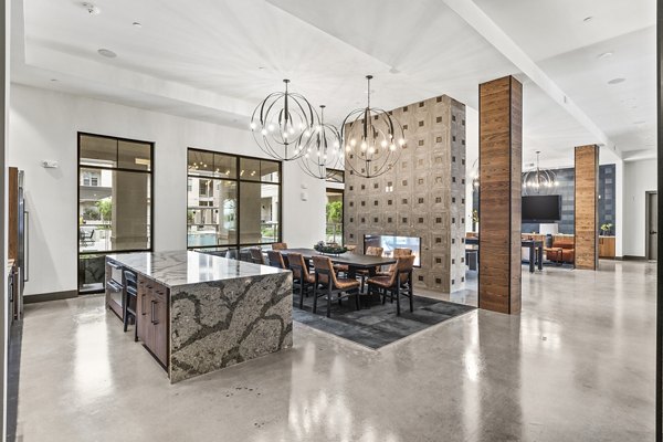 Clubhouse lobby with stylish seating and modern decor in Elan Addison Grove Apartments