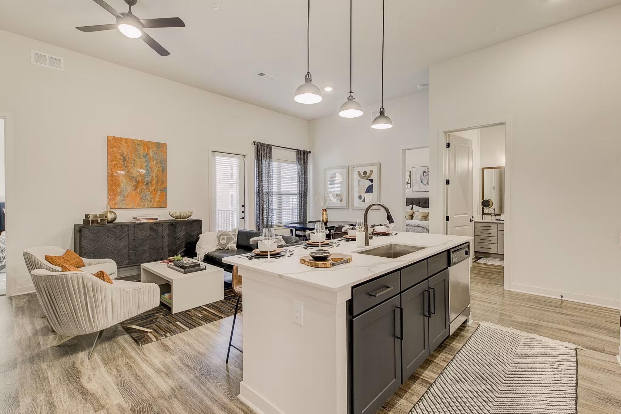 Modern kitchen with stainless steel appliances at Addison Grove Apartments