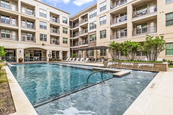 Luxurious outdoor pool at Elan Addison Grove Apartments, offering relaxation and style for residents