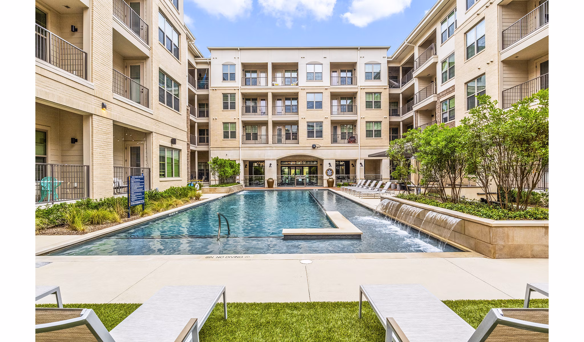 Chic poolside lounging at Elan Addison Grove Apartments with modern design and lush surroundings