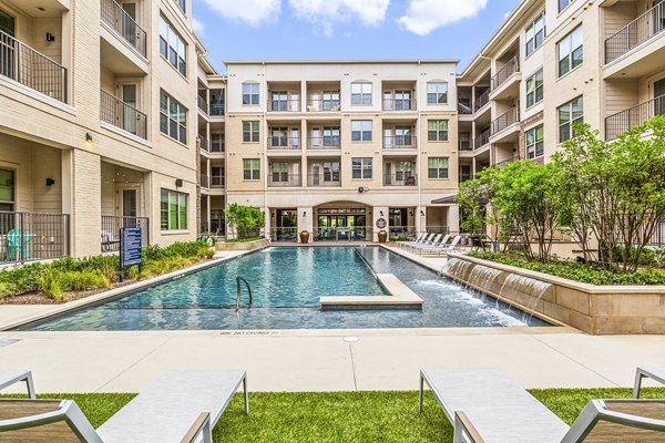 Chic poolside lounging at Elan Addison Grove Apartments with modern design and lush surroundings
