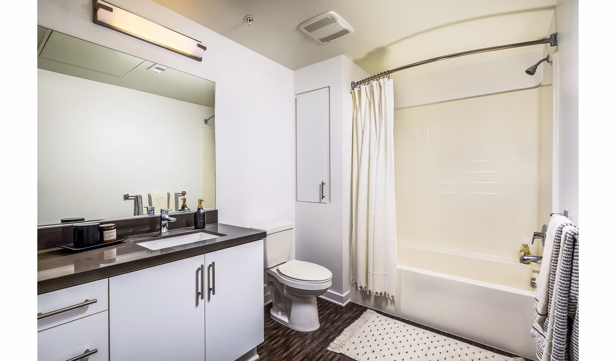 Modern bathroom featuring sleek fixtures at Be DTLA Apartments